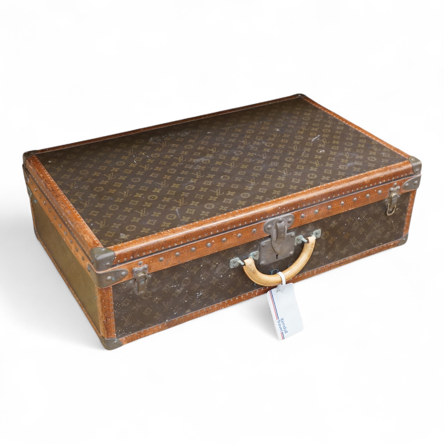 A vintage Louis Vuitton monogram suitcase with two original keys, numbered 793692 to the linen covered interior, height 22cm, width 76cm, depth 46cm